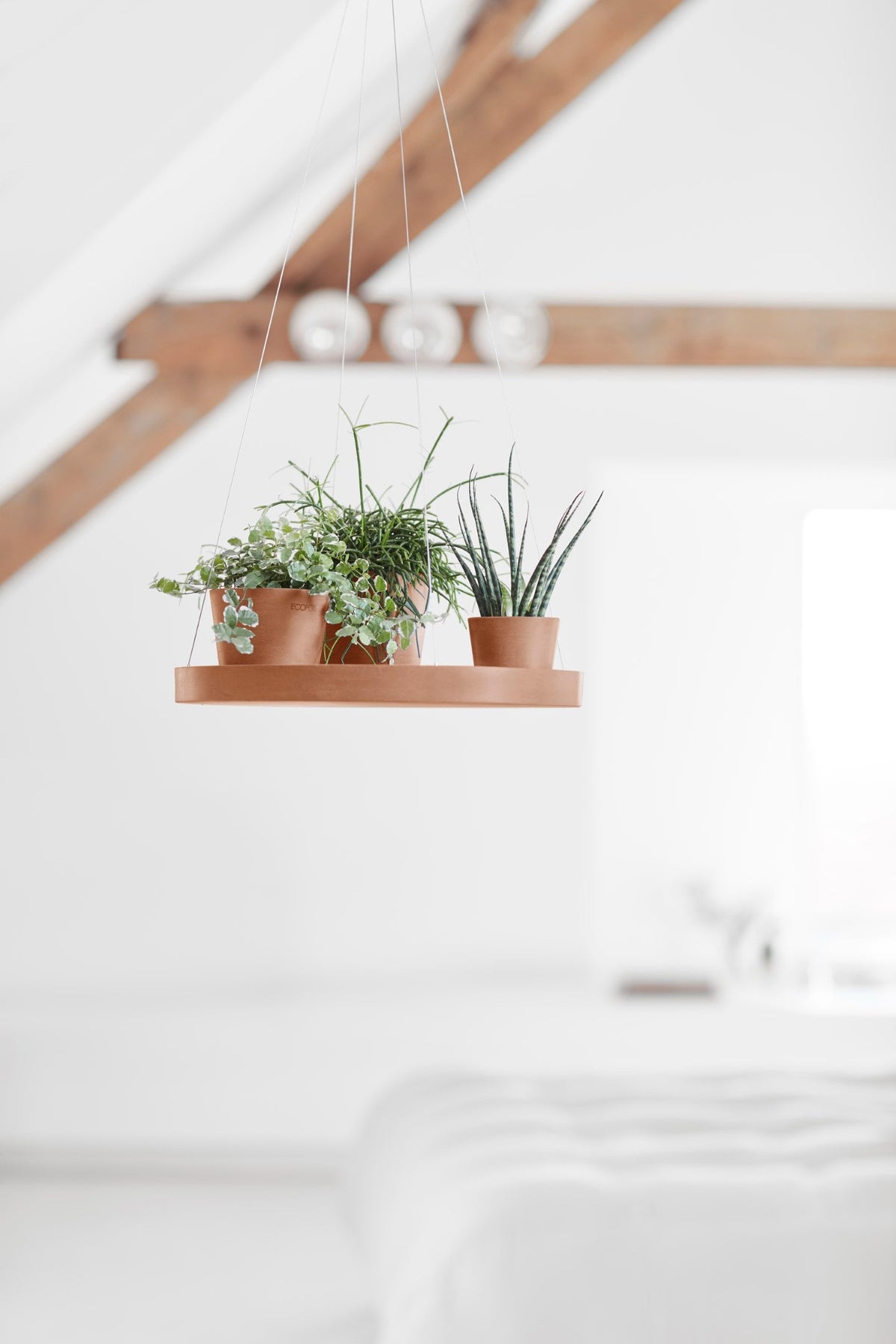 Aluslautanen ripustettava 36cm terracotta – tunnelmakuva
