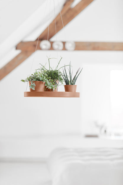 Aluslautanen ripustettava 36cm terracotta – tunnelmakuva